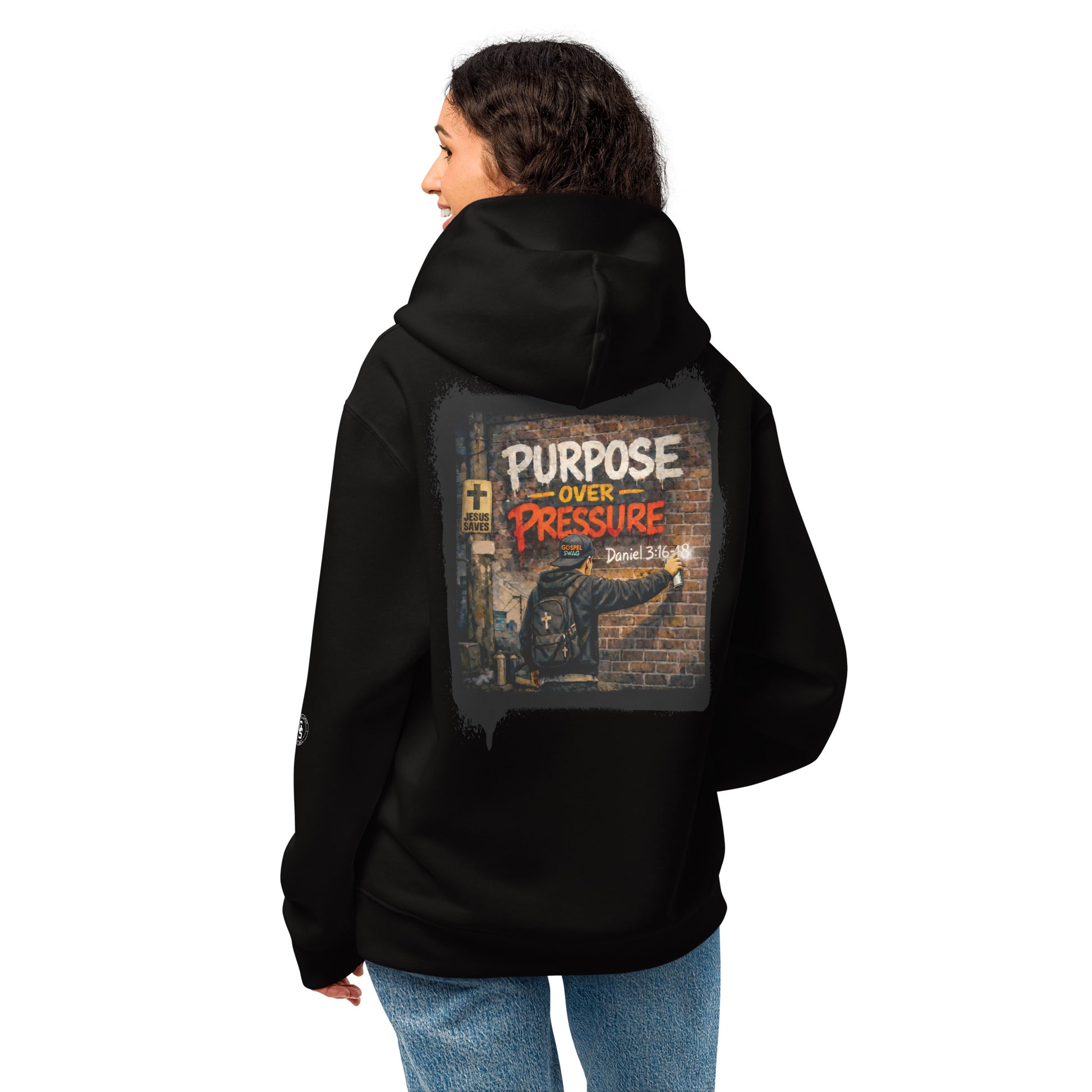 Person wearing a black hoodie with a motivational quote on the back, standing against a white background